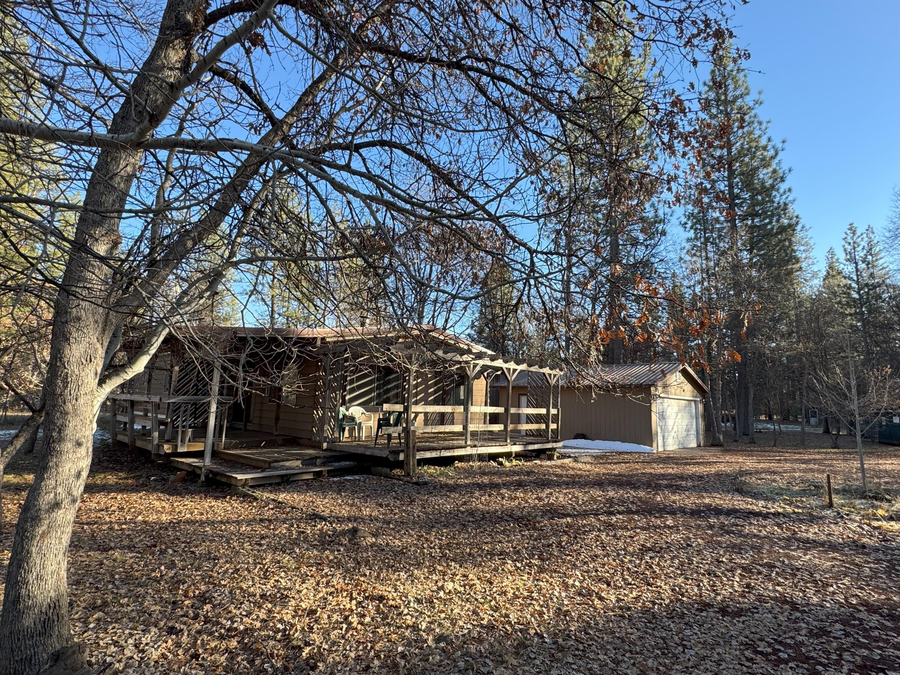 a house view with a backyard space