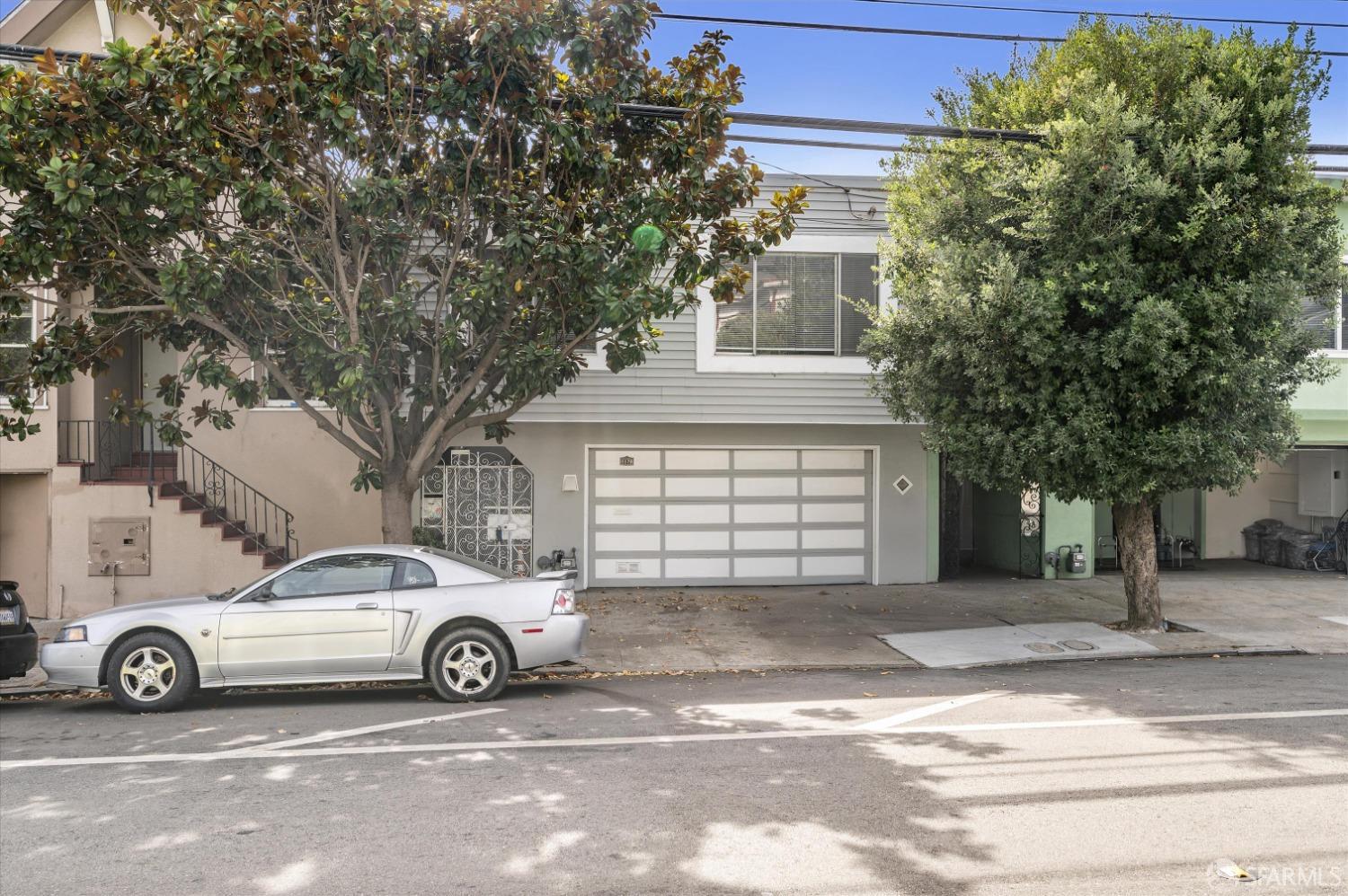 a car parked in front of a house