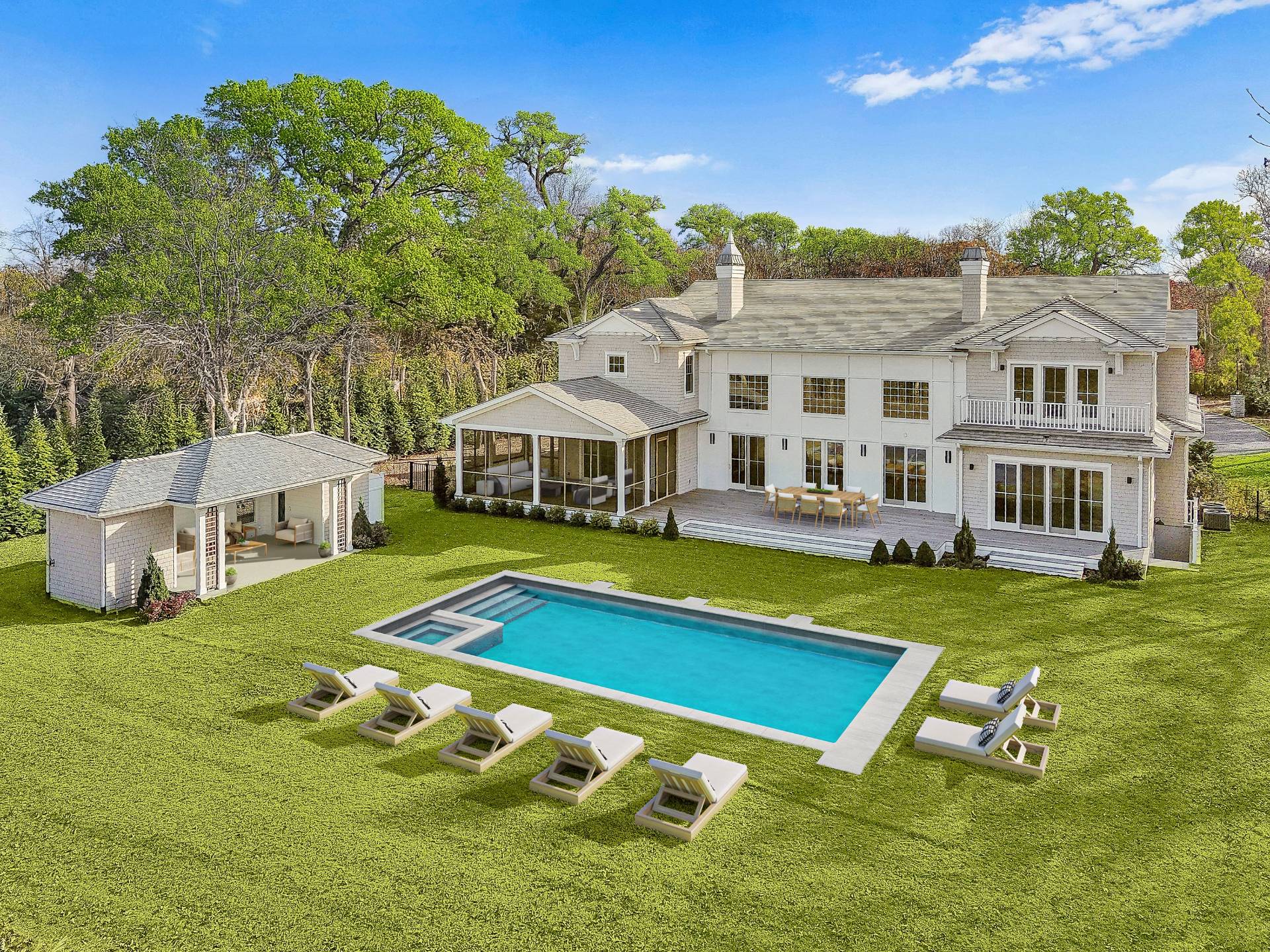 a view of an house with swimming pool and deck