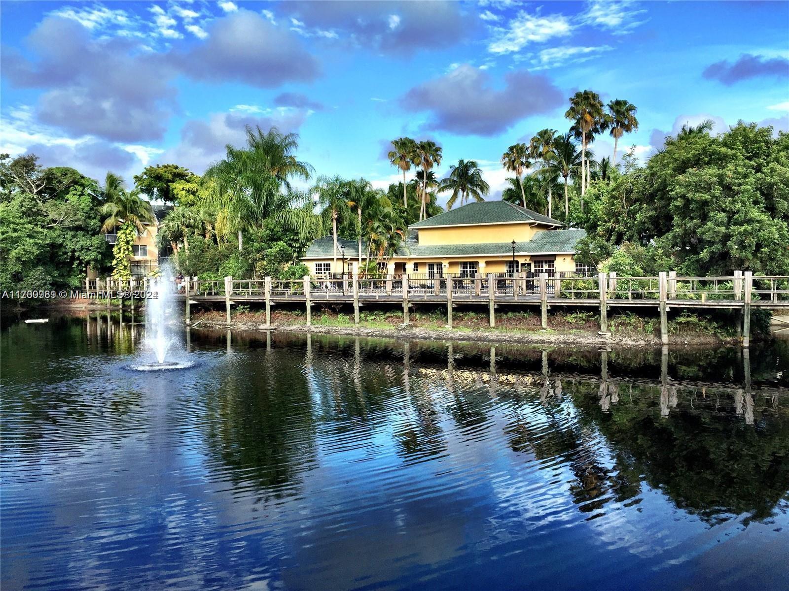 a view of a lake with a outdoor space