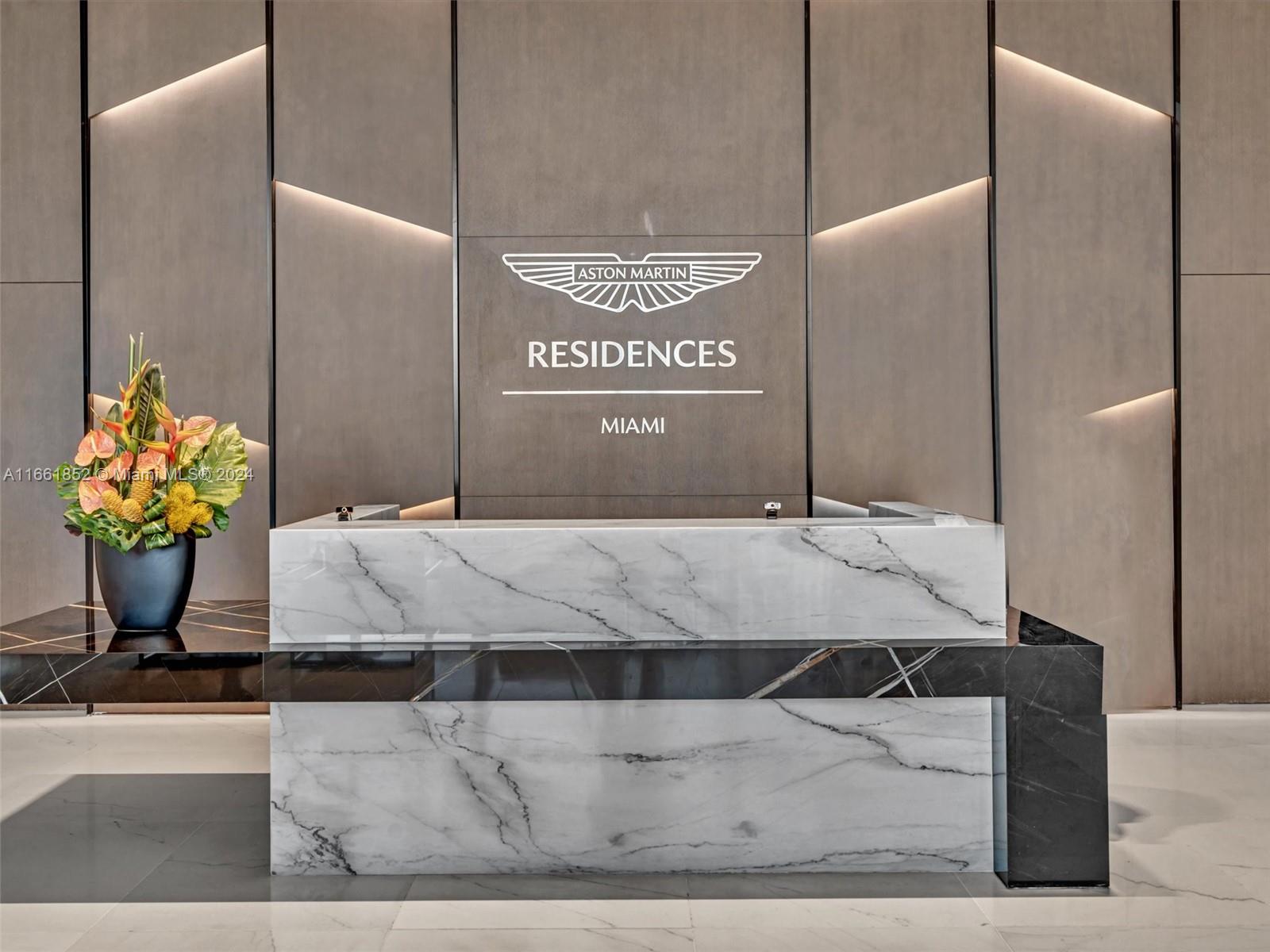 a bathroom with a granite countertop sink