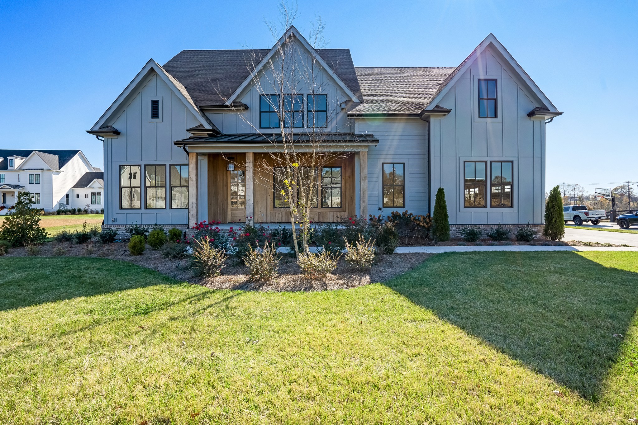 a front view of a house with garden