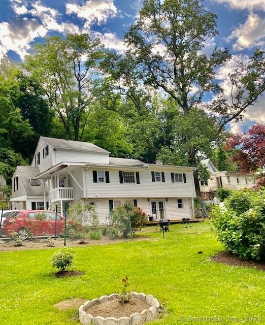 a view of a house with a big yard