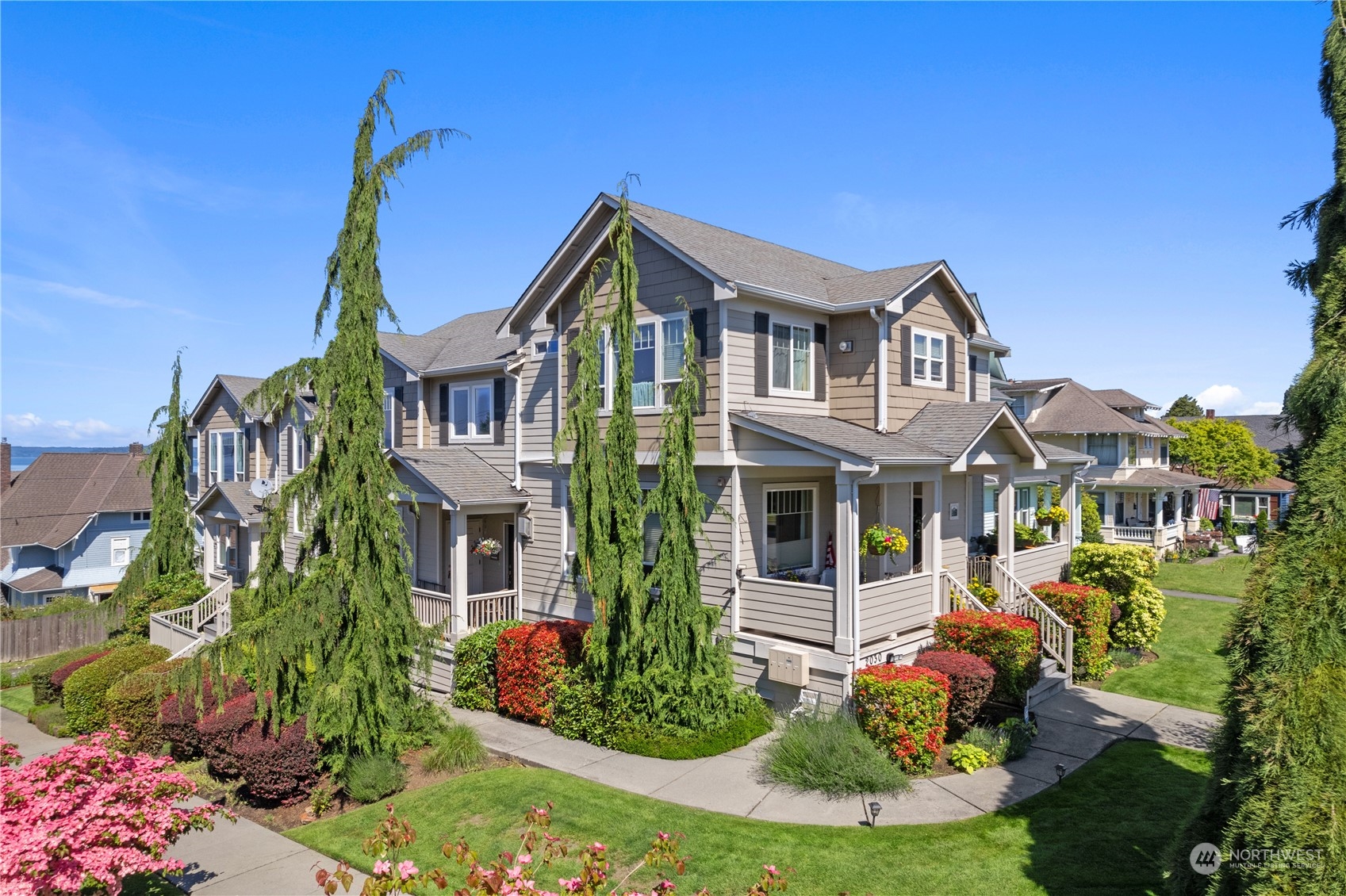 a front view of a house with garden