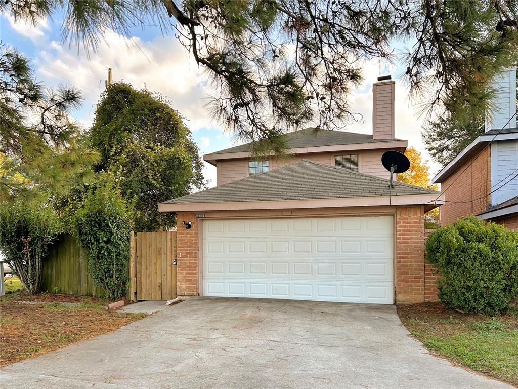 front view of a house with a garage