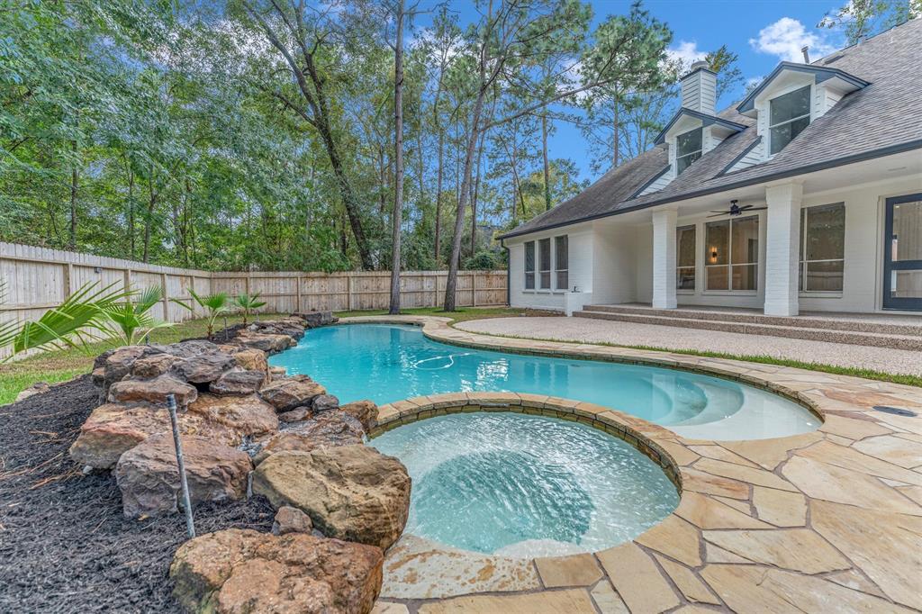 a view of a house with swimming pool