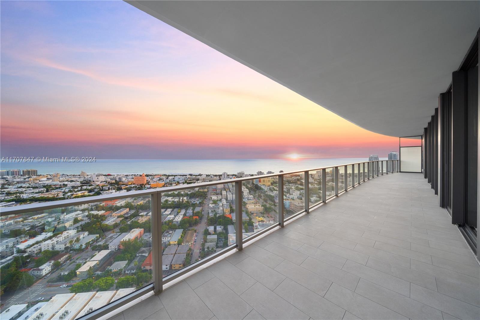 a view of balcony with city and mountain view