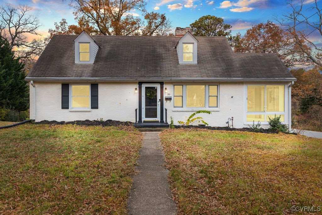 front view of a house with a yard