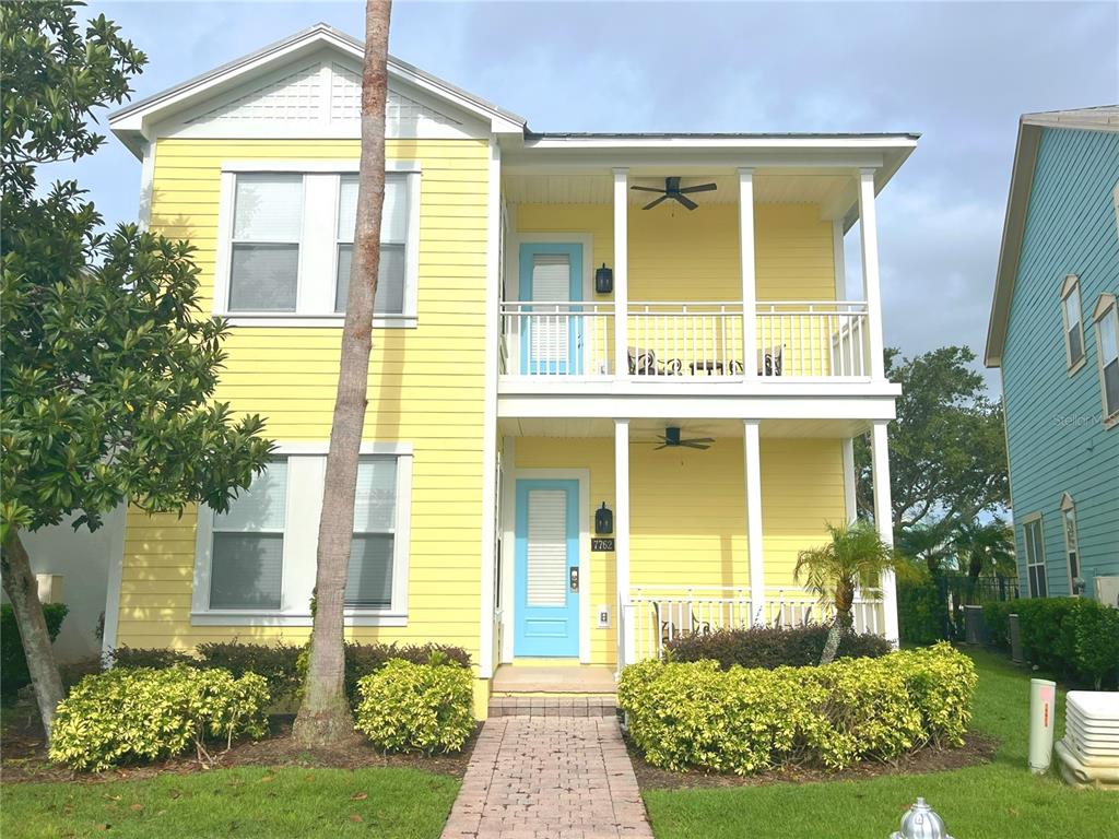 a front view of a house having yard