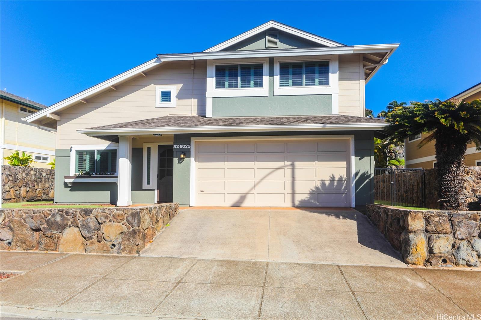 a front view of a house with a outdoor space