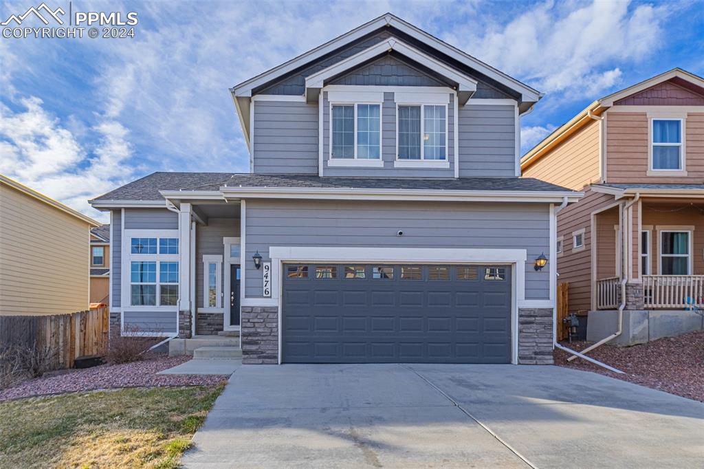 Craftsman-style home with a garage