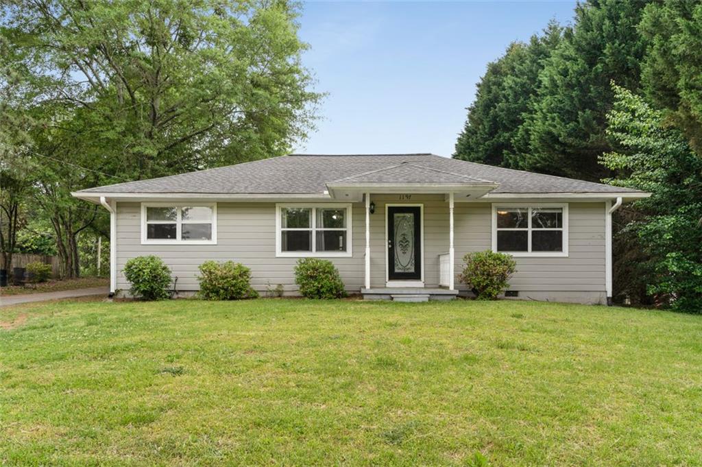 front view of a house and a yard