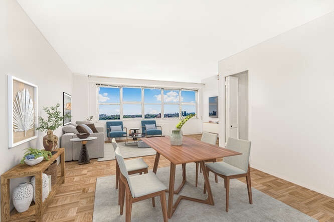 a living room with furniture and a window