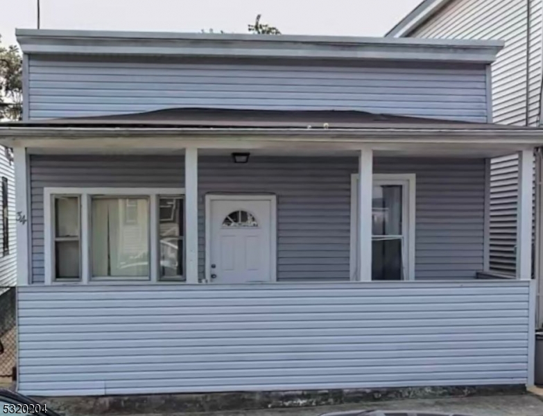 a view of a house with a large window