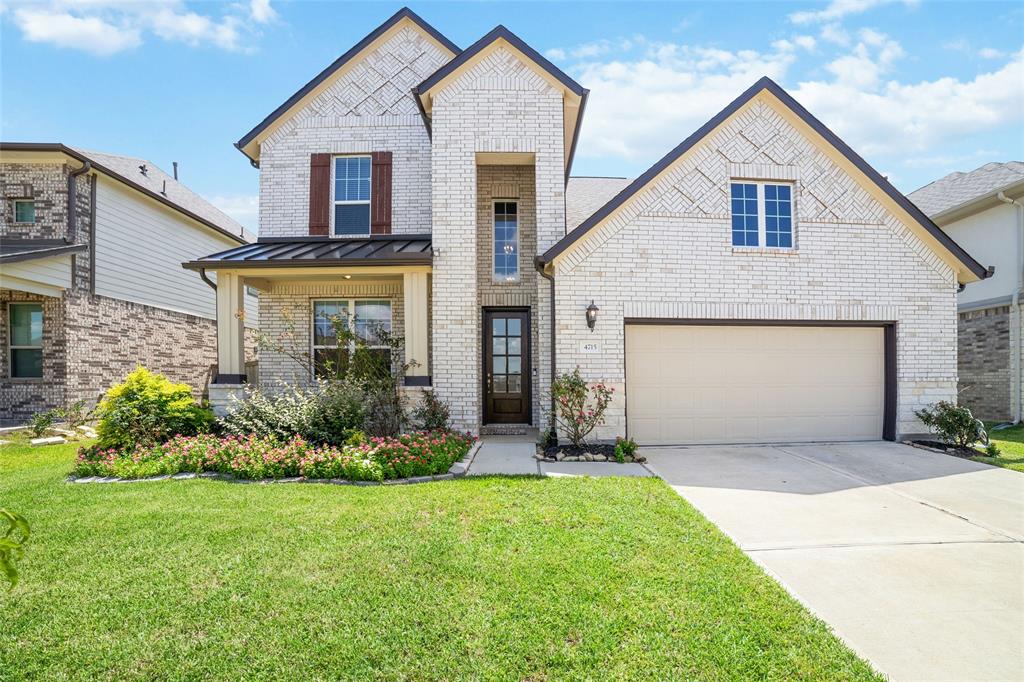 Gorgeous Modern Farmhouse front view will surely impress family and guests alike!