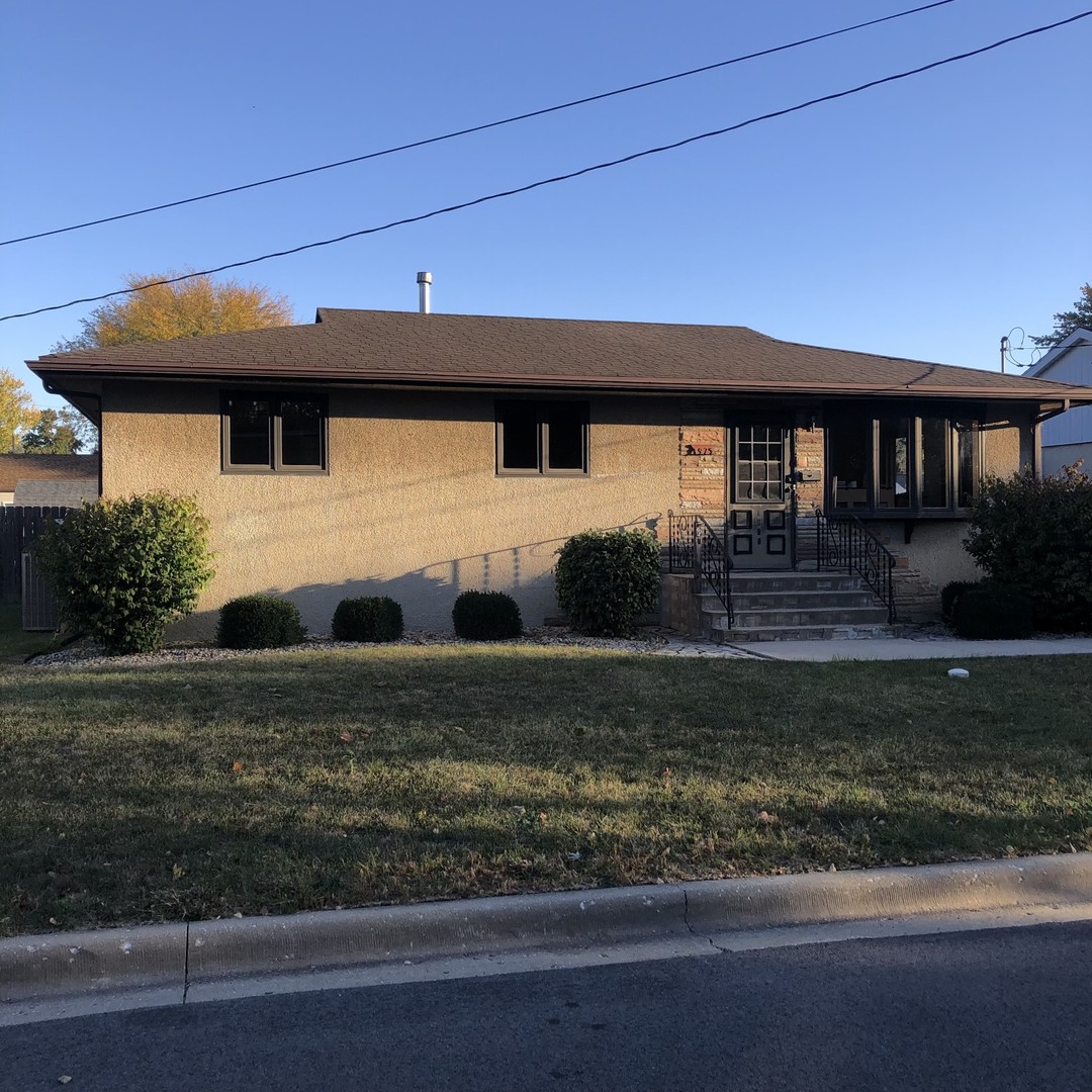 a front view of house with yard