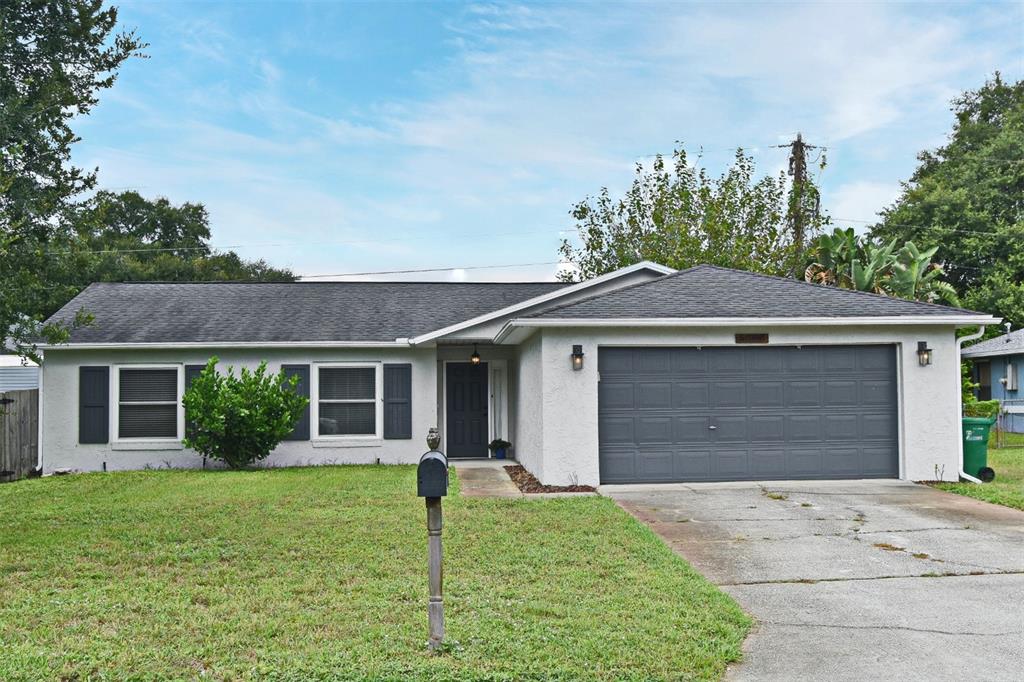 front view of house with a yard