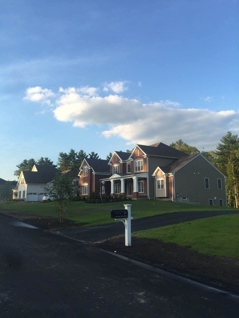 a view of a house with a big yard