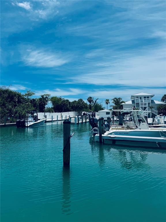 a view of ocean with boats