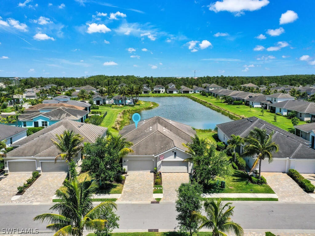 a view of lake and houses with outdoor space