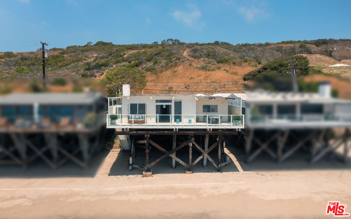 a view of a house with roof deck