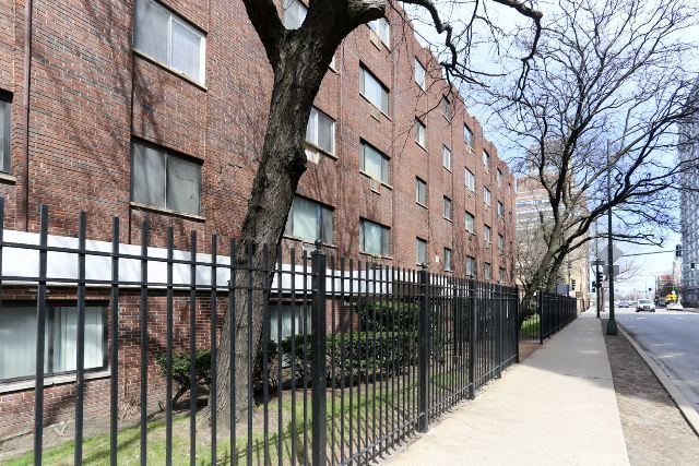 a view of a building with a street view