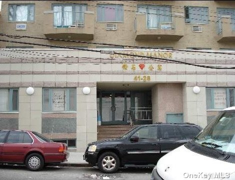 a car parked in front of a building