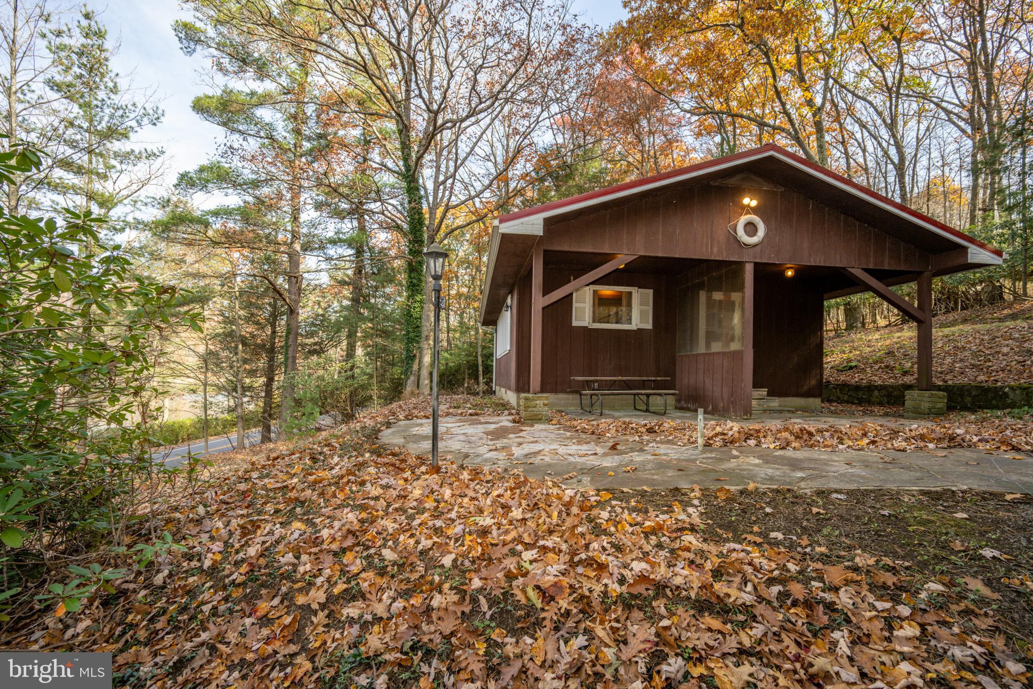 a house with trees in the background