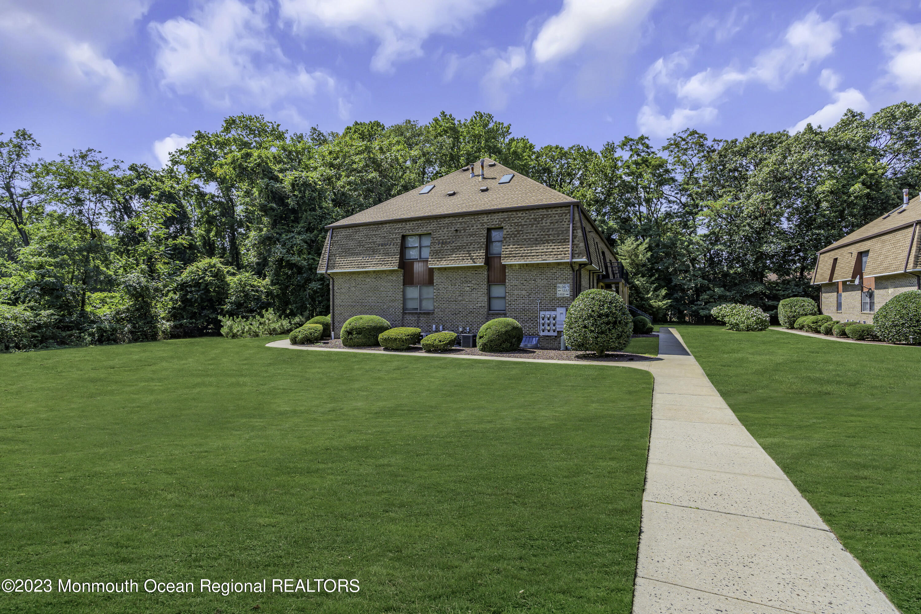 a view of a backyard with garden