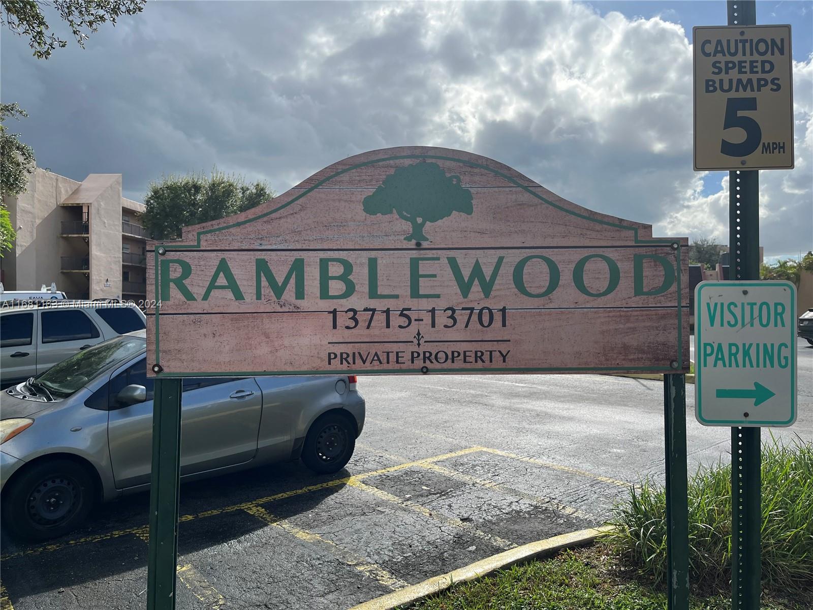 a street sign on a pole on a street