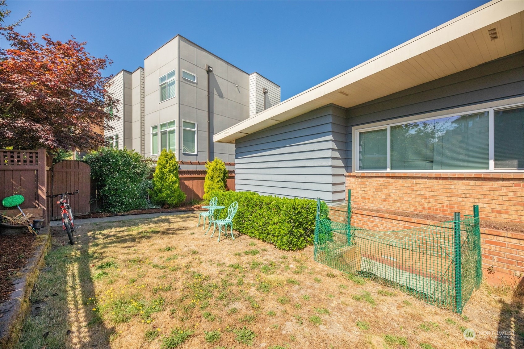 a view of a back yard of the house