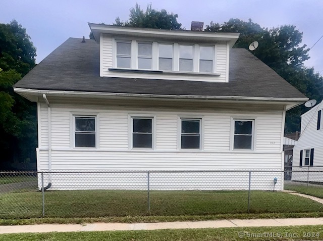 a house that has a window in front of it