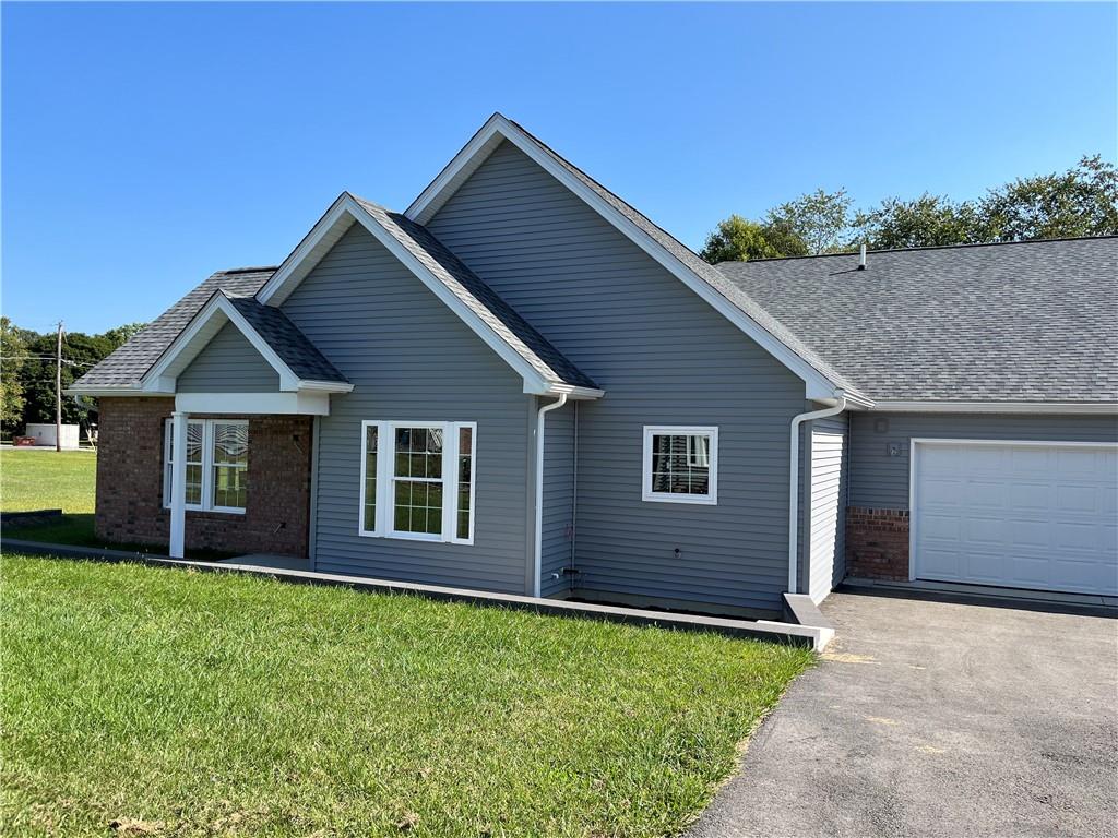 front view of house with a yard