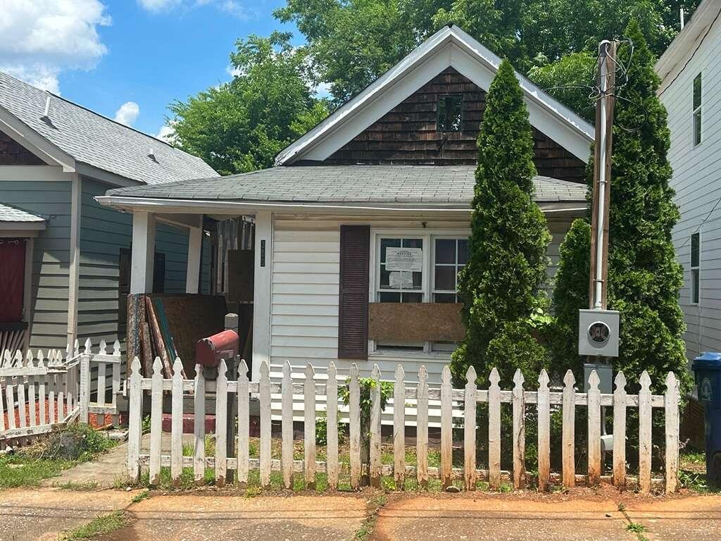 a front view of house with a yard