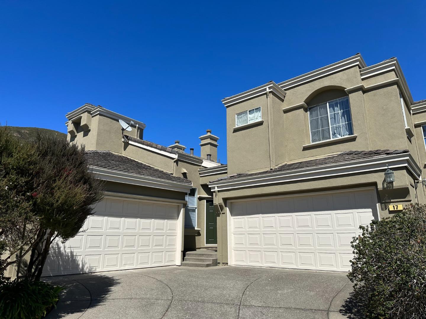 a view of a house with a garage