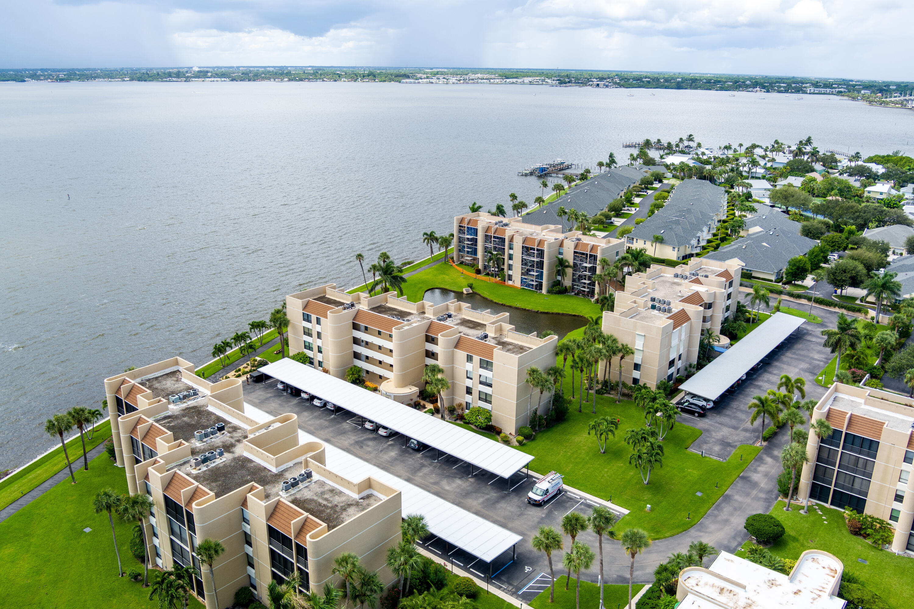 a aerial view of a house with a lake view