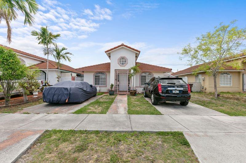 a view of a house with a patio