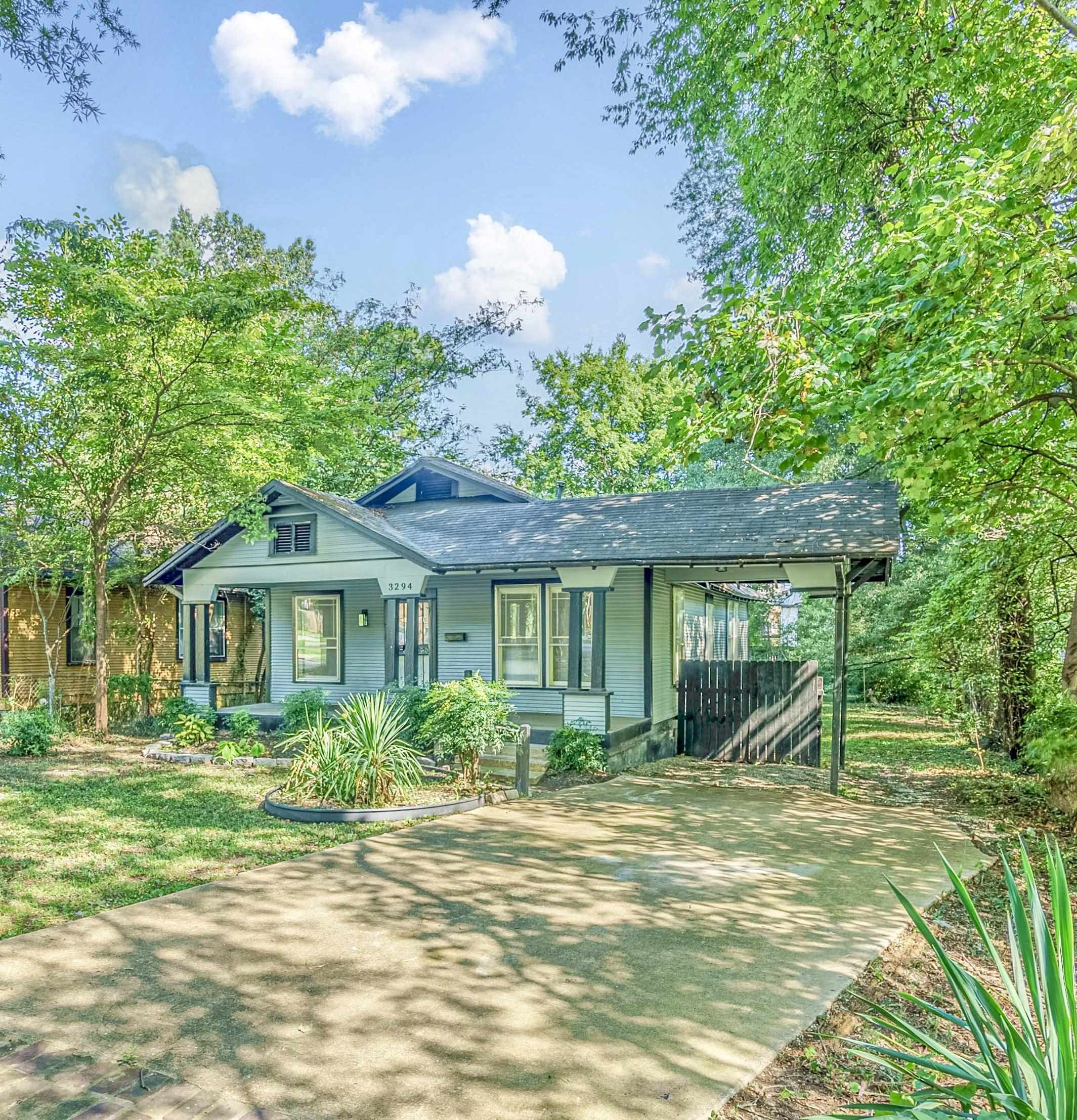 View of front of house with covered porch