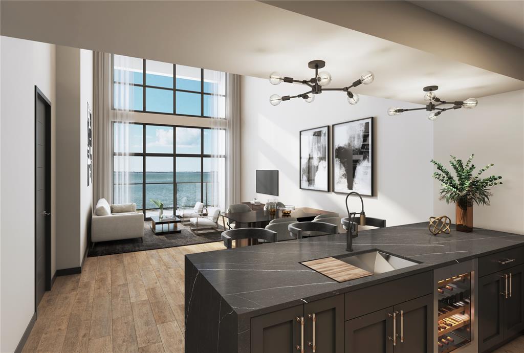 a kitchen with a counter space a sink and a window