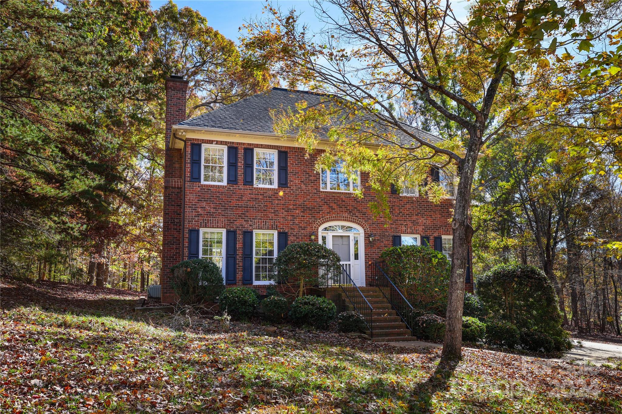 front view of a house with a yard