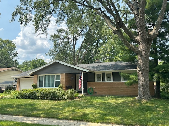 front view of a house and a yard