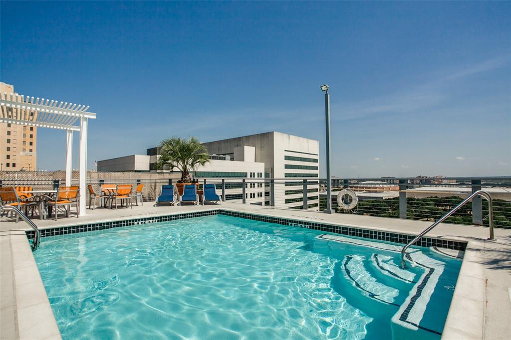 a view of a house with swimming pool