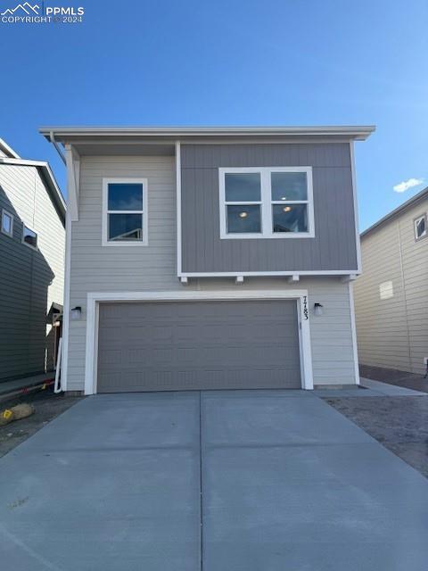 a view of a house with a garage