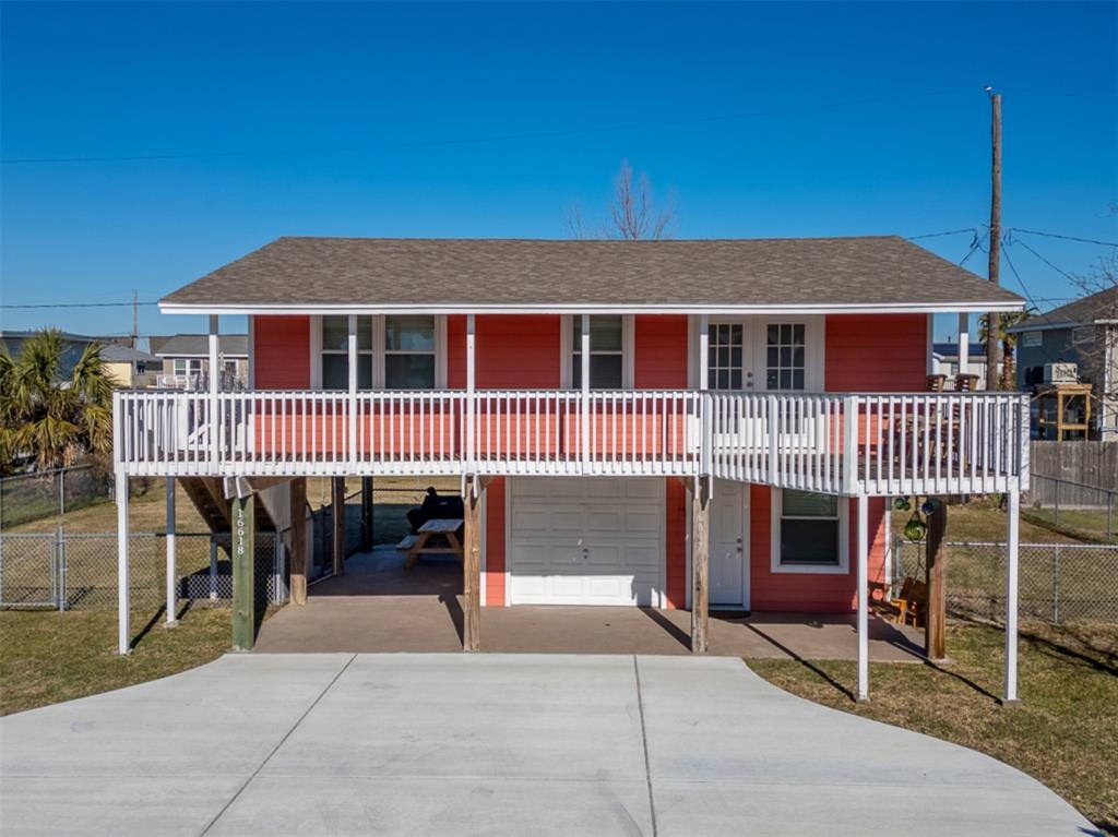 a front view of a house with a patio