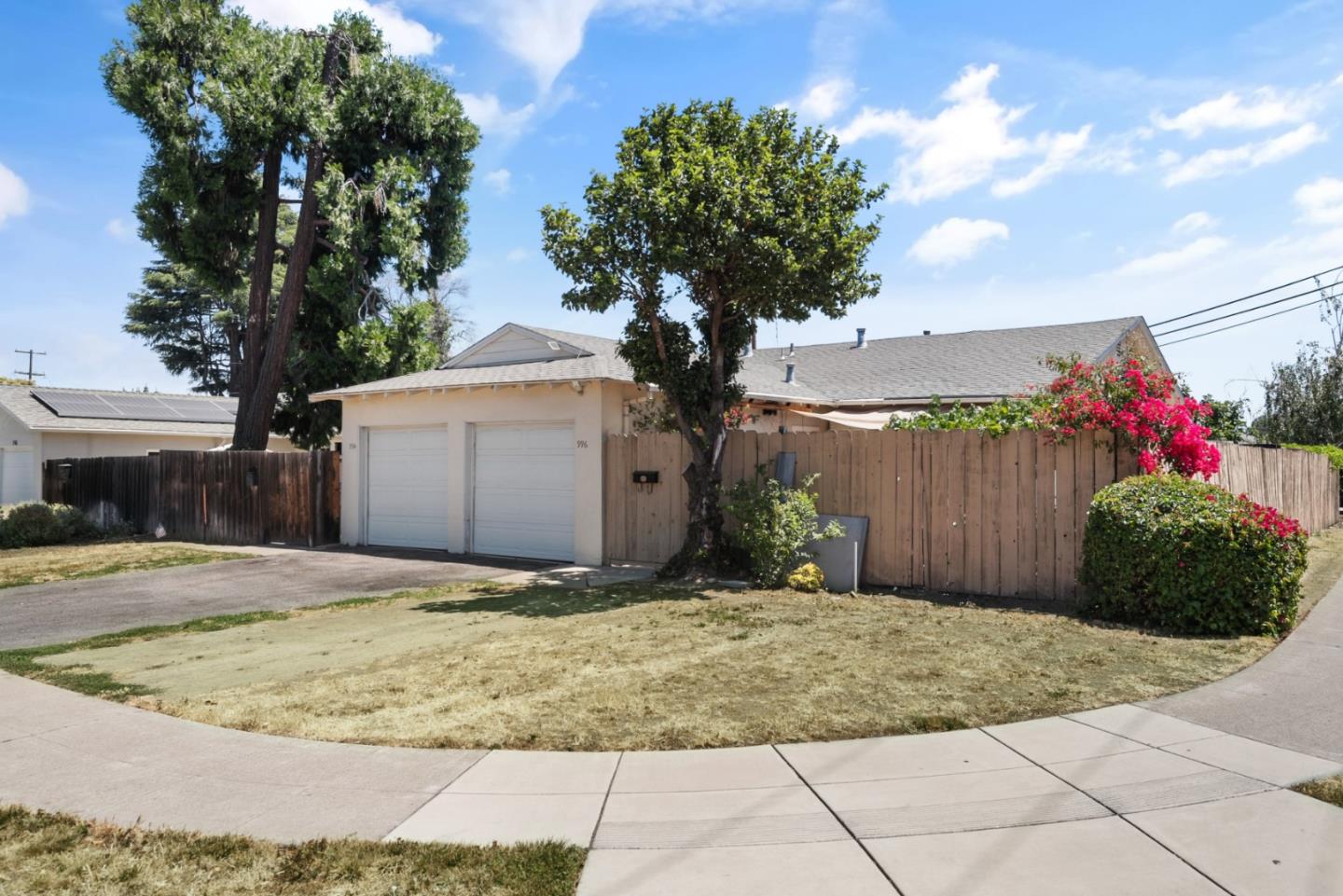 a view of a backyard of the house