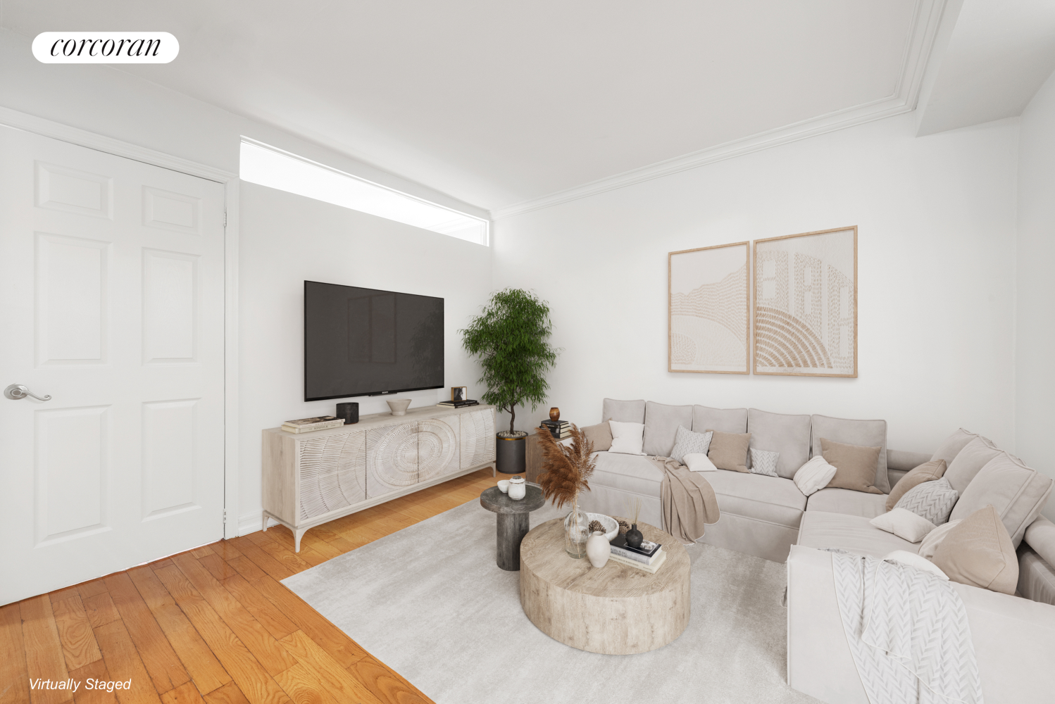 a living room with furniture and a flat screen tv