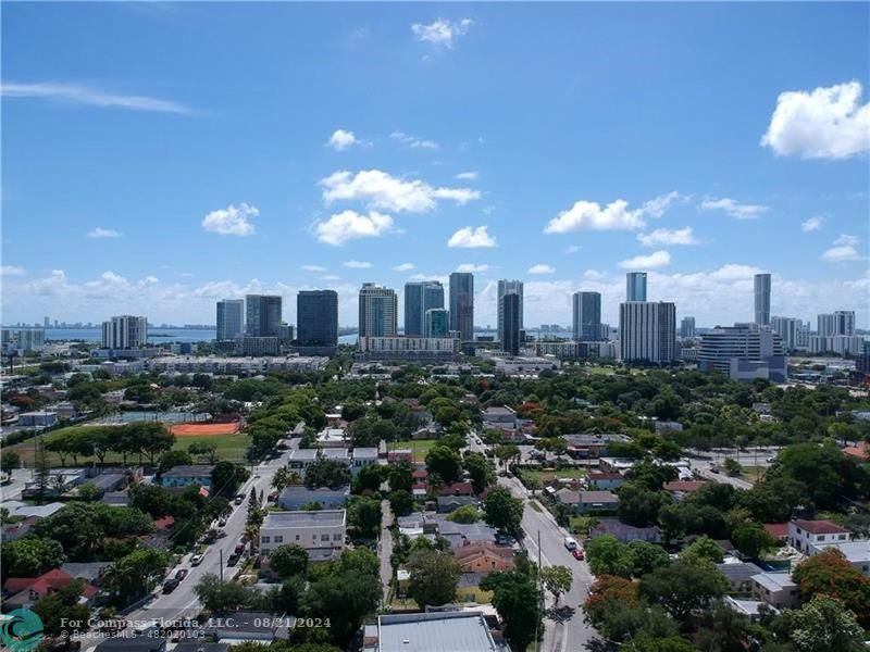 a view of a city with tall buildings