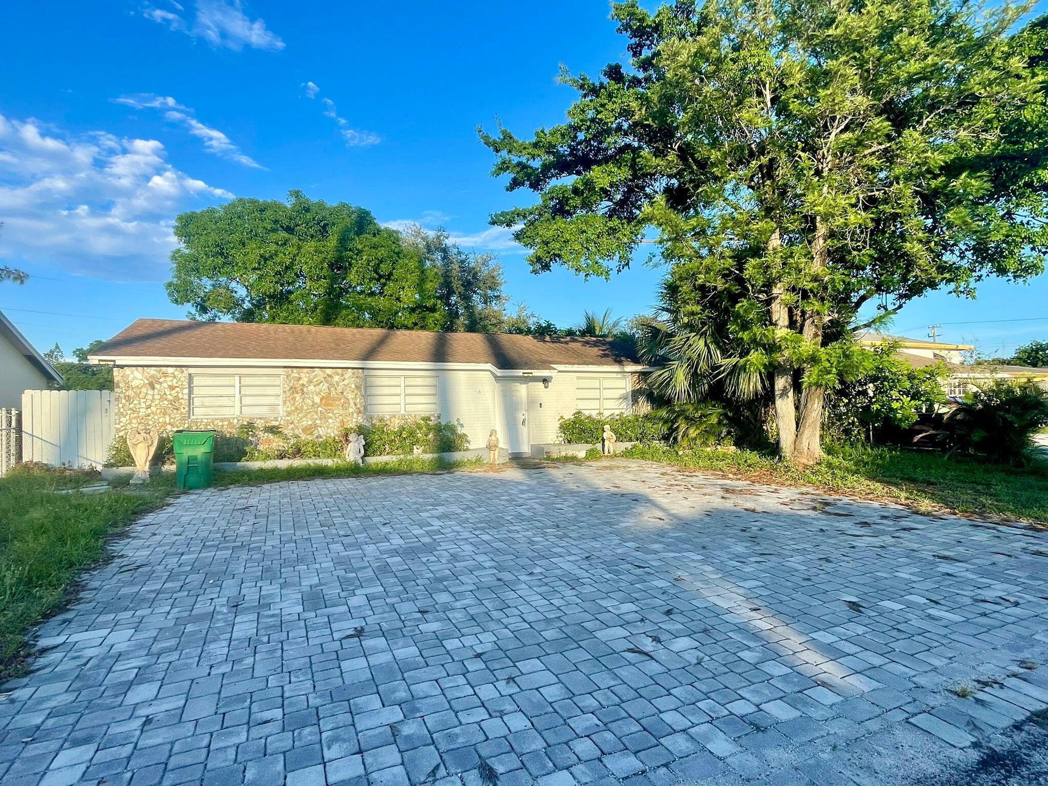 a view of backyard with green space