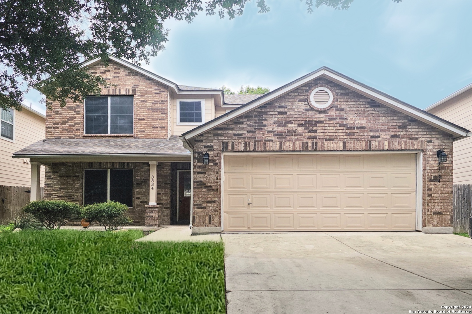 a view of a house with a garage