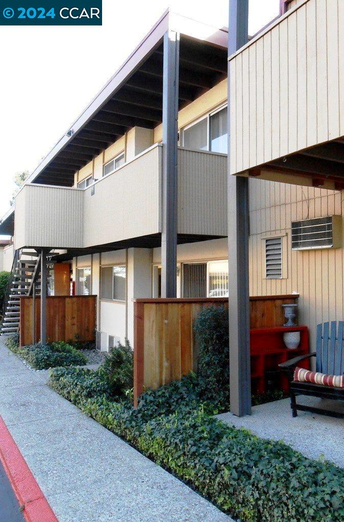 a view of a car park in front of house